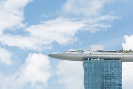 SINGAPORE-Jul 15, 2015: The Marina Bay Sands Resort in Singapore. The roofs of towers are decorated with a park in the form of a ship 340 m long and capacity up to 3,900 people.のeditorial素材