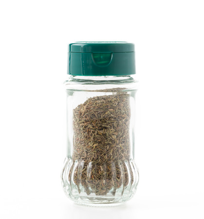 bottle of thyme on whiteの写真素材