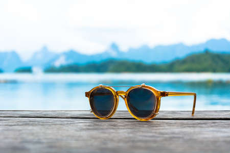 vintage sun glasses on woodの写真素材