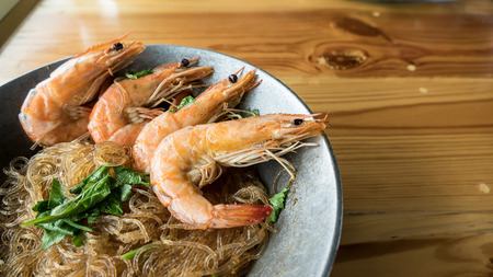 Casseroled prawns/shrimps with glass noodles.の写真素材