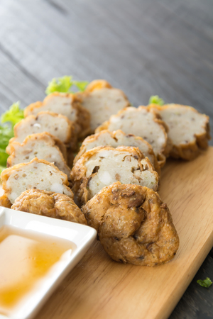 fish balls on wood backgroundの写真素材