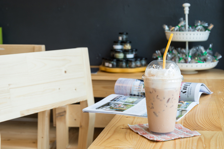 iced milk tea on wood tableの写真素材