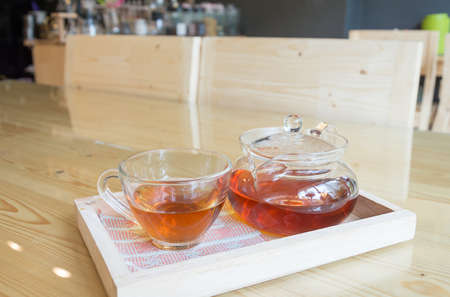 hot tea on wood tableの写真素材
