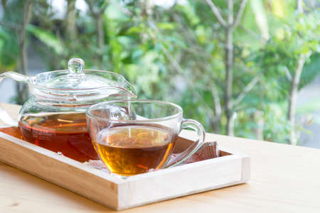 hot tea on wood tableの写真素材