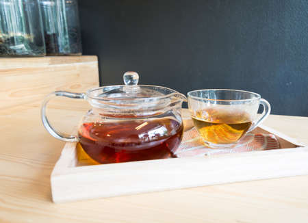 hot tea on wood tableの写真素材