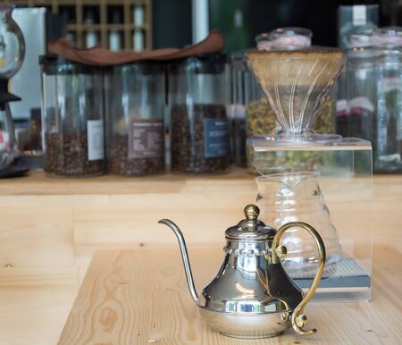 Hand drip coffee on wood tableの写真素材