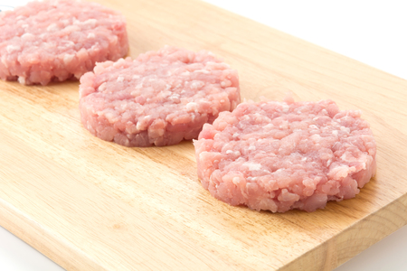 minced pork on wood boardの写真素材