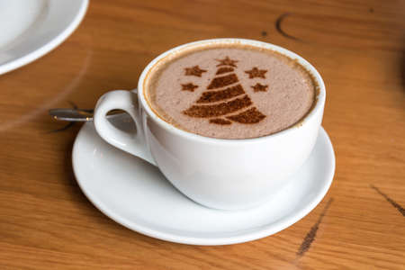 christmas tree , drawing on latte art coffee cup