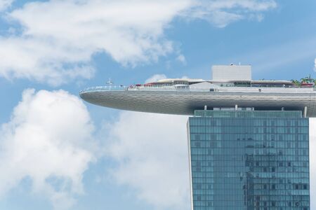 SINGAPORE-Jul 15, 2015: The Marina Bay Sands Resort in Singapore. The roofs of towers are decorated with a park in the form of a ship 340 m long and capacity up to 3,900 people.のeditorial素材