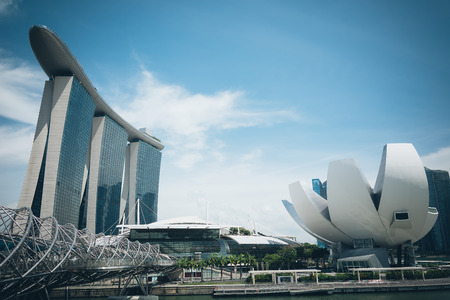 SINGAPORE - July 16, 2015: ArtScience Museum is one of the attractions at Marina Bay Sands, an integrated resort in Singapore.- with film filter effectのeditorial素材