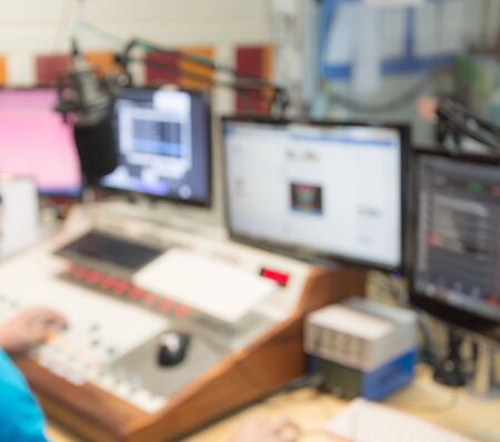 blurred radio studio and mixer