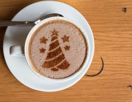 christmas tree , drawing on latte art coffee cupの写真素材