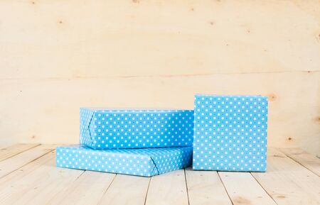 gift box on wood backgroundの写真素材
