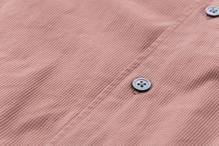 Close up of a button on shirt