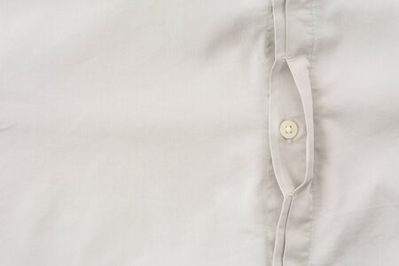 Close up of a button on shirt