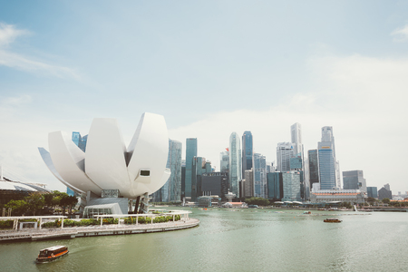 SINGAPORE - July 16, 2015: ArtScience Museum is one of the attractions at Marina Bay Sands, an integrated resort in Singapore.- with film filter effectのeditorial素材
