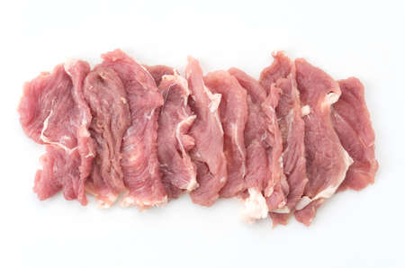 slice pork on white backgroundの写真素材