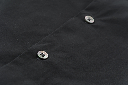 Close up of a button on shirtの写真素材
