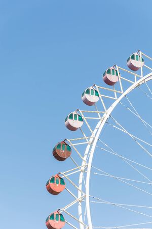 Ferris wheel with blue skyの写真素材