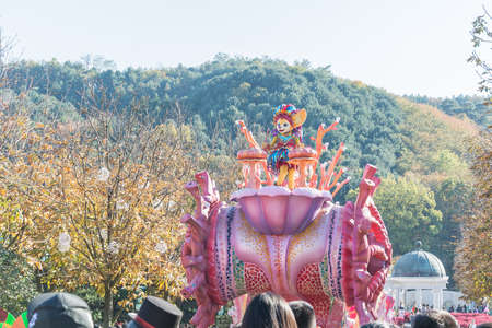 SOUTH KOREA - October 31: Dancers in colorful costumes take part in a street parade in Everland Resort, Yongin City, South Korea, on October 31, 2015のeditorial素材