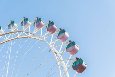 Ferris wheel with blue sky