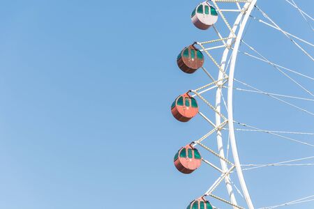 Ferris wheel with blue skyの写真素材