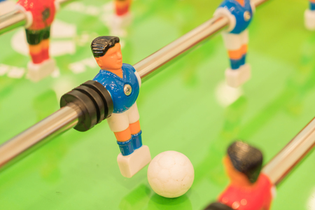 plastic football player on table footballの写真素材