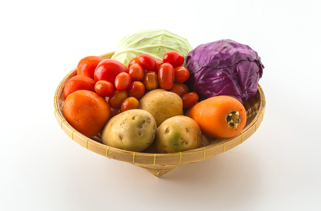 fresh vegetable salad on white backgroundの写真素材