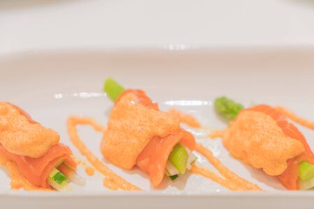 salmon roll with spicy sauceの写真素材