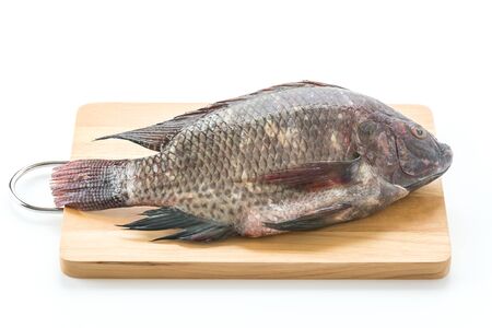 Black Tilapia or Tilapia on wood board