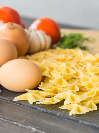 dry pasta spaghetti with ingredientの写真素材