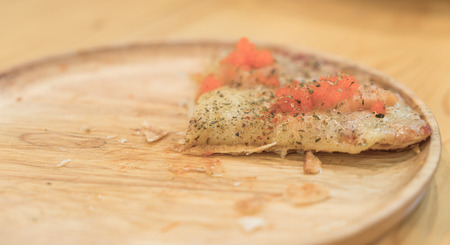 smoked salmon pizza on wood table