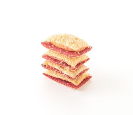mini pie biscuit with strawberry jam on white backgroundの写真素材