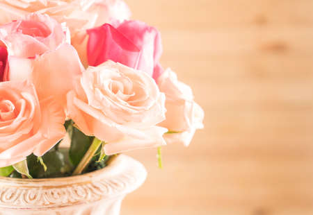 rose bouquet on wood backgroundの写真素材