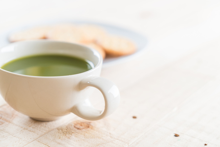 hot matcha on wood backgroundの写真素材