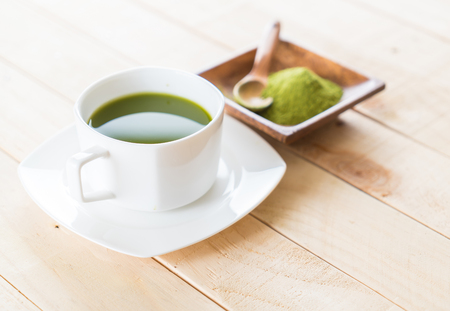 hot matcha on wood backgroundの写真素材