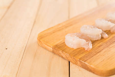 fresh shrimp on wood boardの写真素材