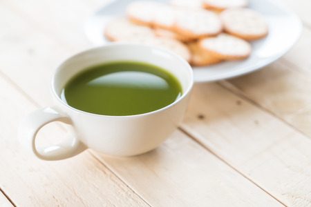hot matcha on wood backgroundの写真素材