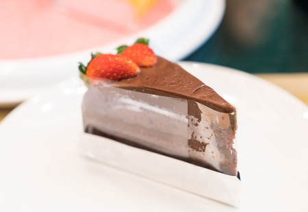 chocolate cake with strawberry on topの写真素材