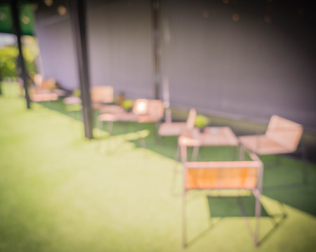 abstact blur empty table in cafe - vintage effect filterの写真素材