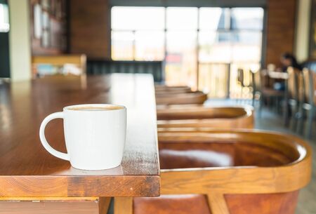 coffee cup in cafe - soft focus with vintage effect picture styleの写真素材