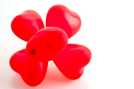Red balloons on white backgroundの写真素材