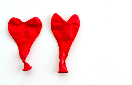 Red balloons on white backgroundの写真素材