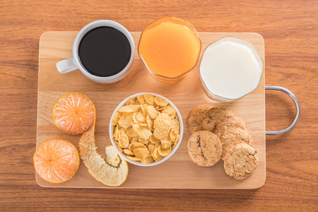 Table Breakfast - Continental Breakfast, fruit, cereals and orange juiceの写真素材