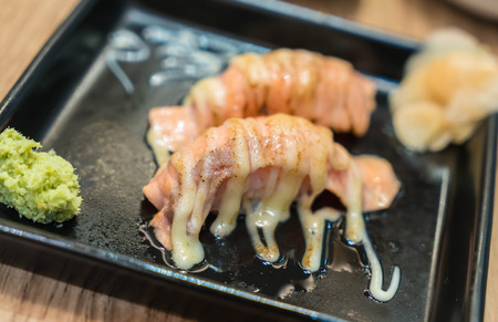 salmon burned mayo nigiri - japanese foodの写真素材