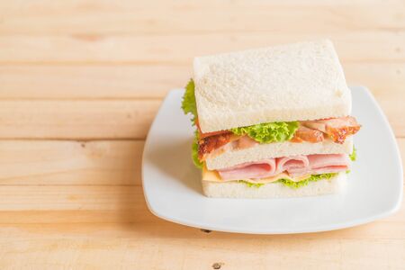 sandwich on wood backgroundの写真素材