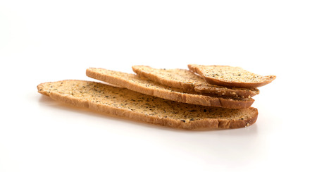 Garlic and herb bread slices on white background