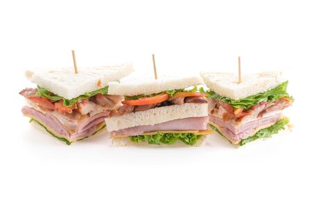 chicken and ham sandwich on white backgroundの写真素材