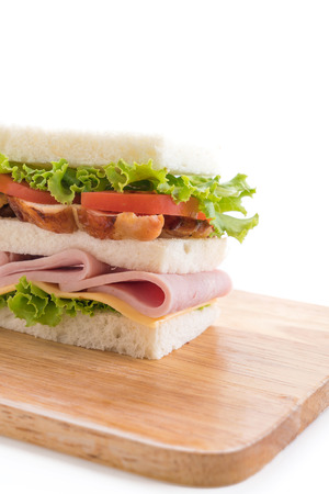 chicken and ham sandwich on white backgroundの写真素材