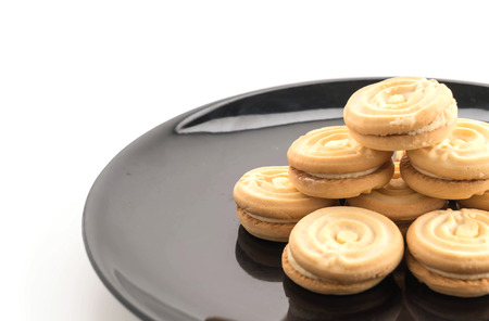 cookie biscuit with cream on white